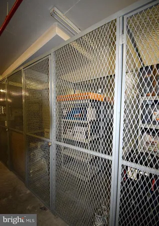 a view of parking garage with cars