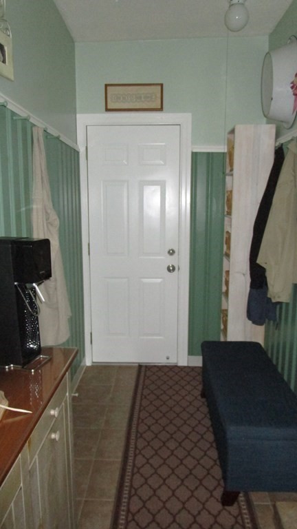 52 Pine Ridge Road Montgomery, MA 01085 - Photo 37 of 39 a bedroom with a bed and a flat tv screen on the dresser