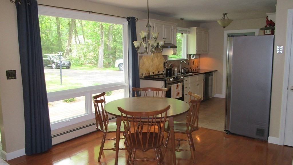 52 Pine Ridge Road Montgomery, MA 01085 - Photo 8 of 39 a dining room with furniture and window