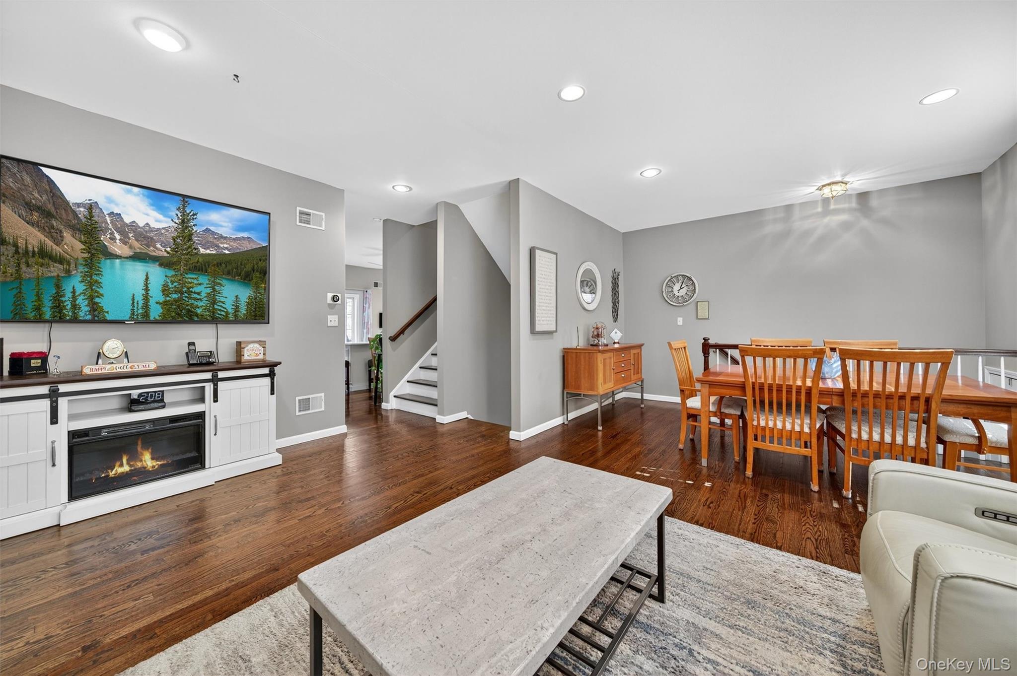 26 Peter Turner Road Monroe, NY 10950 - Photo 11 of 47 a living room with furniture and a flat screen tv