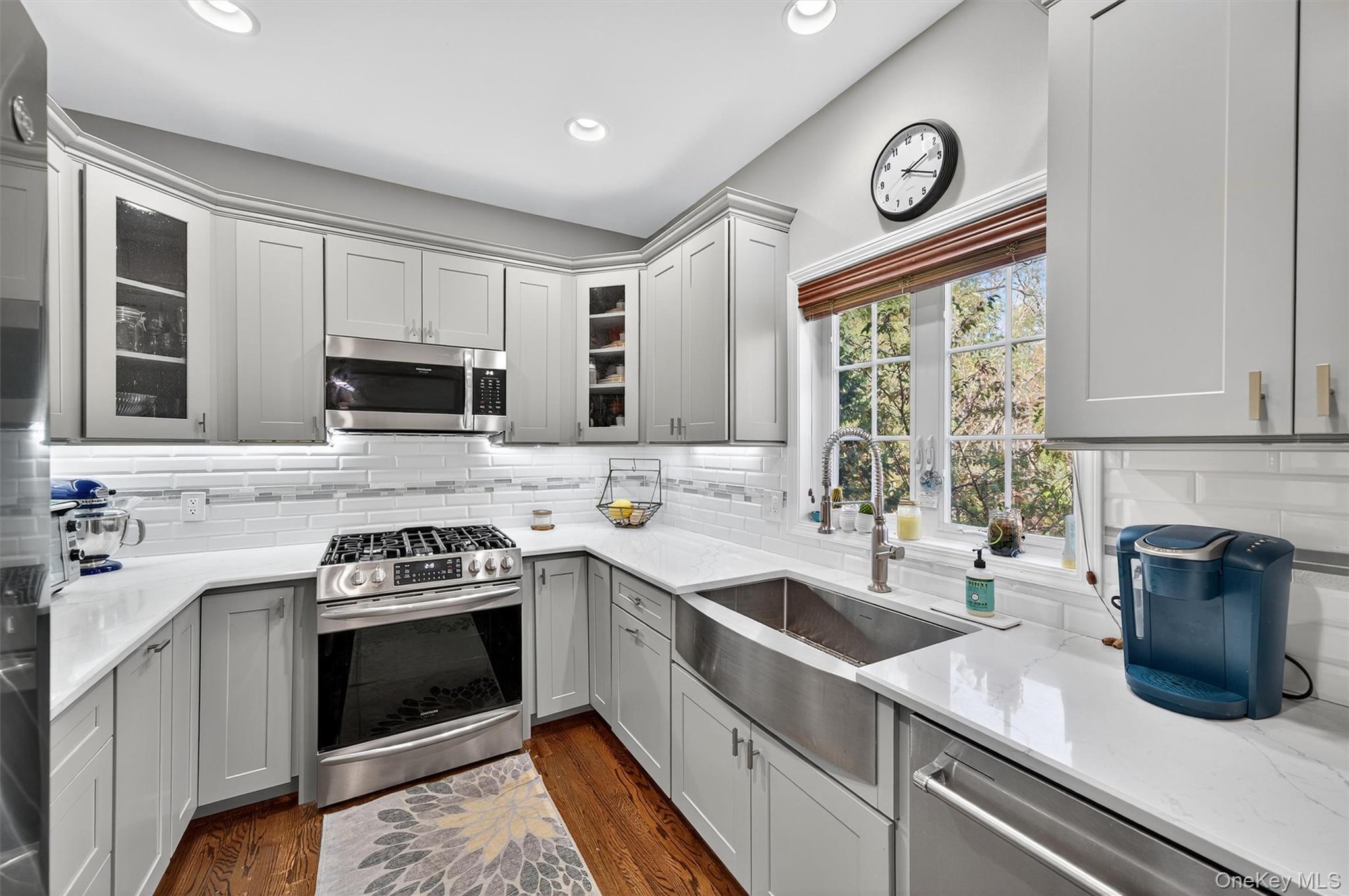 26 Peter Turner Road Monroe, NY 10950 - Photo 19 of 47 a kitchen with a stove a sink and a window