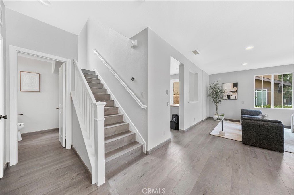311 Nimbus Tustin, CA 92782 - Photo 11 of 39 a view of a livingroom with wooden floor and furniture