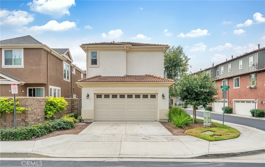 311 Nimbus Tustin, CA 92782 - Photo 2 of 39 a sign on the side of a building