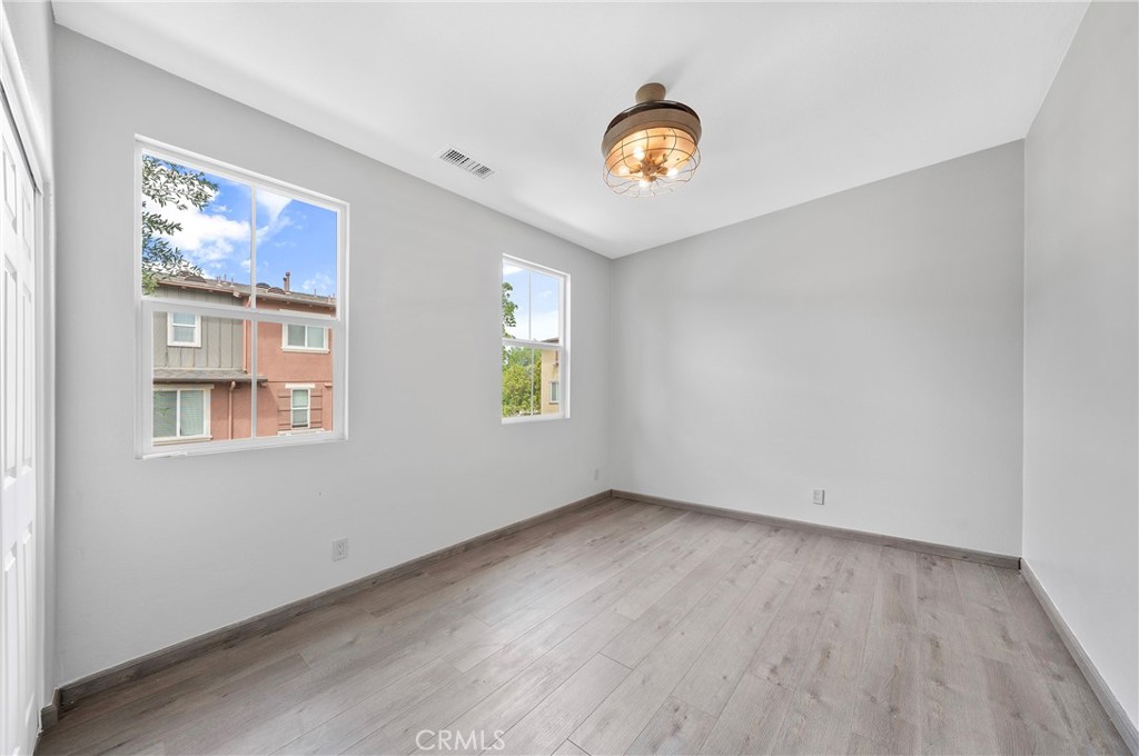 311 Nimbus Tustin, CA 92782 - Photo 26 of 39 an empty room with windows