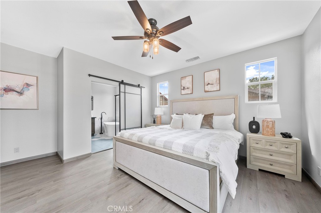 311 Nimbus Tustin, CA 92782 - Photo 30 of 39 a bedroom with a bed and a window