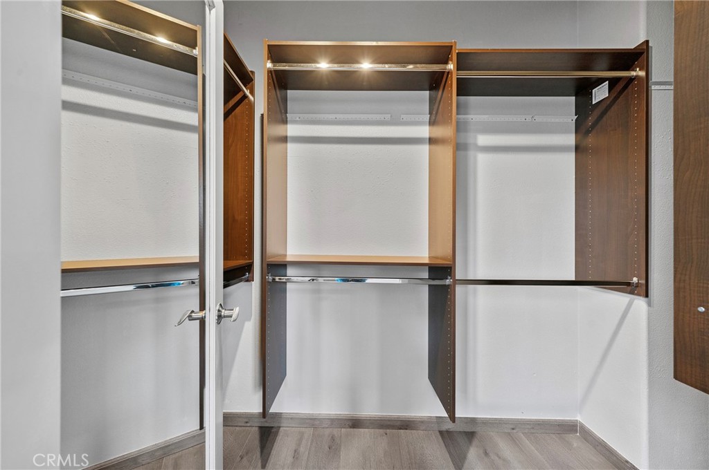 311 Nimbus Tustin, CA 92782 - Photo 32 of 39 a view of walk in closet with empty racks
