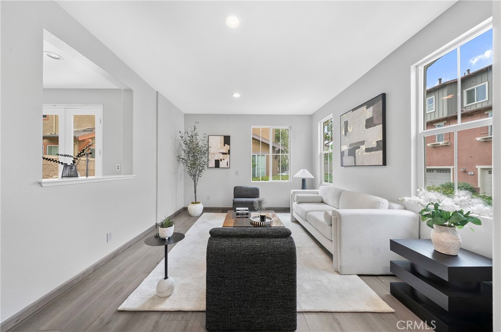 311 Nimbus Tustin, CA 92782 - Photo 5 of 39 a living room with furniture window and wooden floor