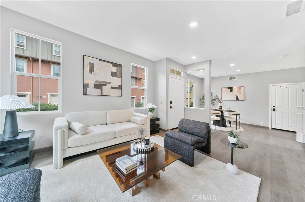 311 Nimbus Tustin, CA 92782 - Photo 7 of 39 a living room with furniture and a large window