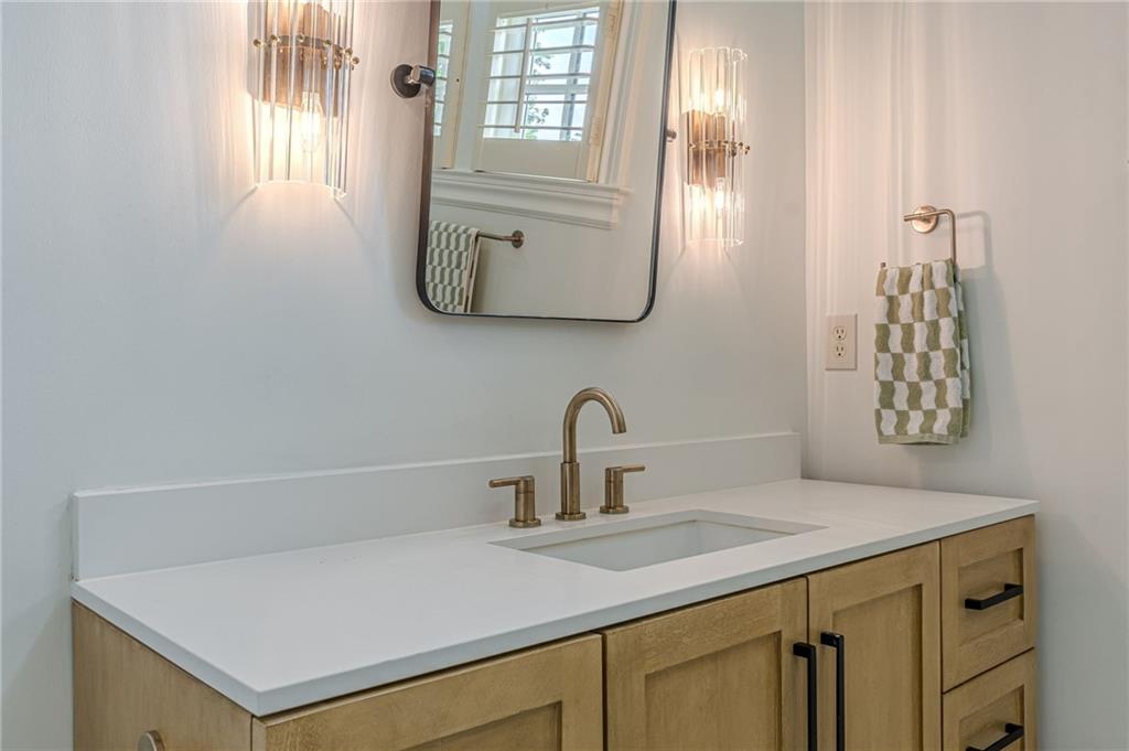 2010 Caladium Way Roswell, GA 30075 - Photo 41 of 71 a bathroom with a sink and a mirror