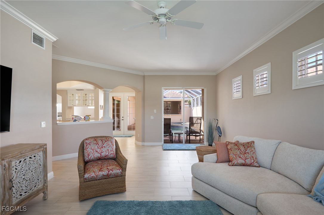 14101 Bently Circle Fort Myers, FL 33912 - Photo 11 of 29 a living room with furniture and a large window