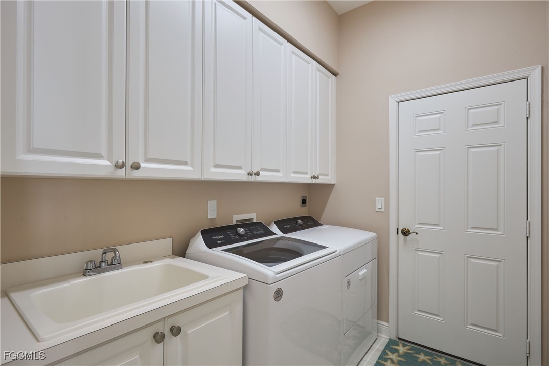 14101 Bently Circle Fort Myers, FL 33912 - Photo 18 of 29 a utility room with dryer and washer
