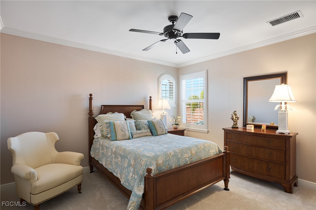 14101 Bently Circle Fort Myers, FL 33912 - Photo 19 of 29 a bedroom with bed and window