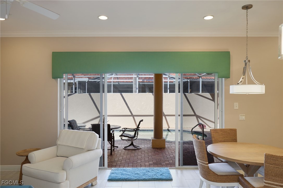 14101 Bently Circle Fort Myers, FL 33912 - Photo 23 of 29 a living room with a couch and a table