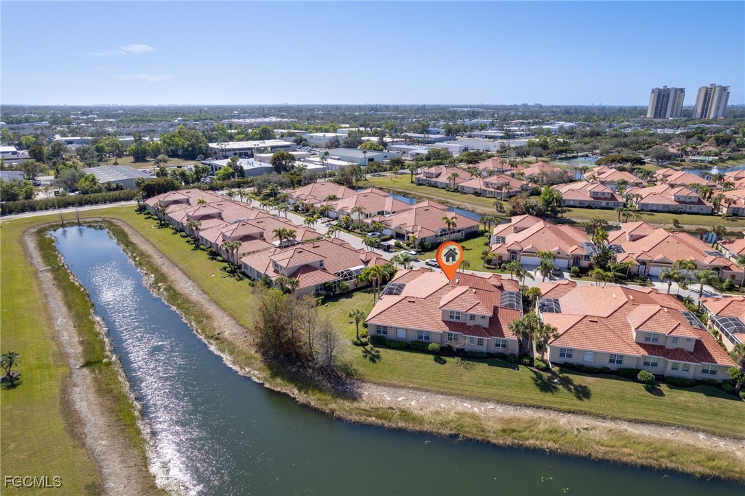 14101 Bently Circle Fort Myers, FL 33912 - Photo 27 of 29 an aerial view of residential houses with outdoor space and lake view