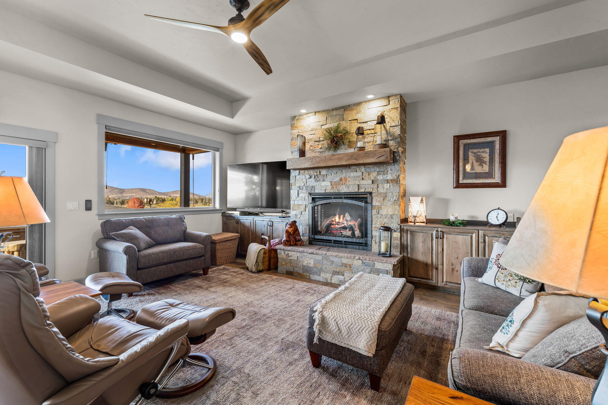 3405 Southwest 45th Street Redmond, OR 97756 - Photo 8 of 76 The built-in's on either side of the fireplace are top quality