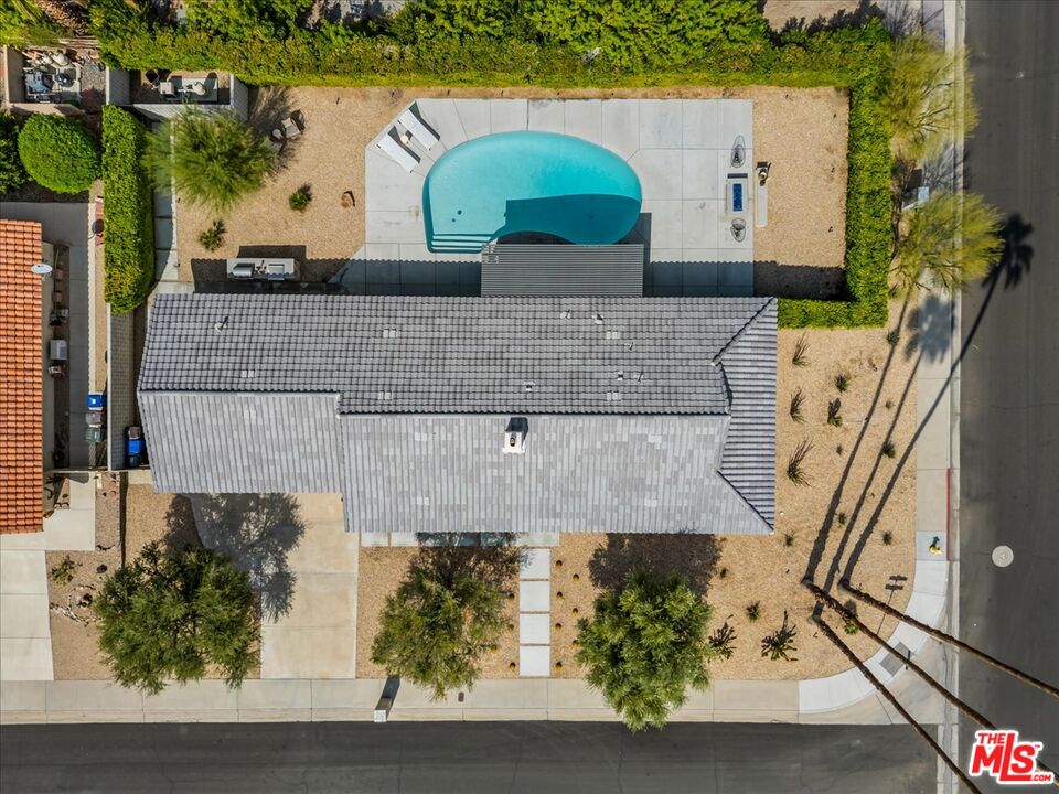 2994 Guadalupe Road Palm Springs, CA 92264 - Photo 32 of 33 an aerial view of a house with a garden and swimming pool