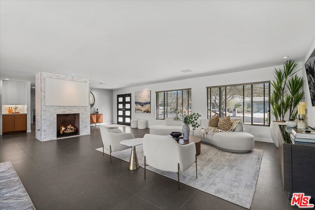 2994 Guadalupe Road Palm Springs, CA 92264 - Photo 5 of 33 a living room with fireplace furniture and a fireplace