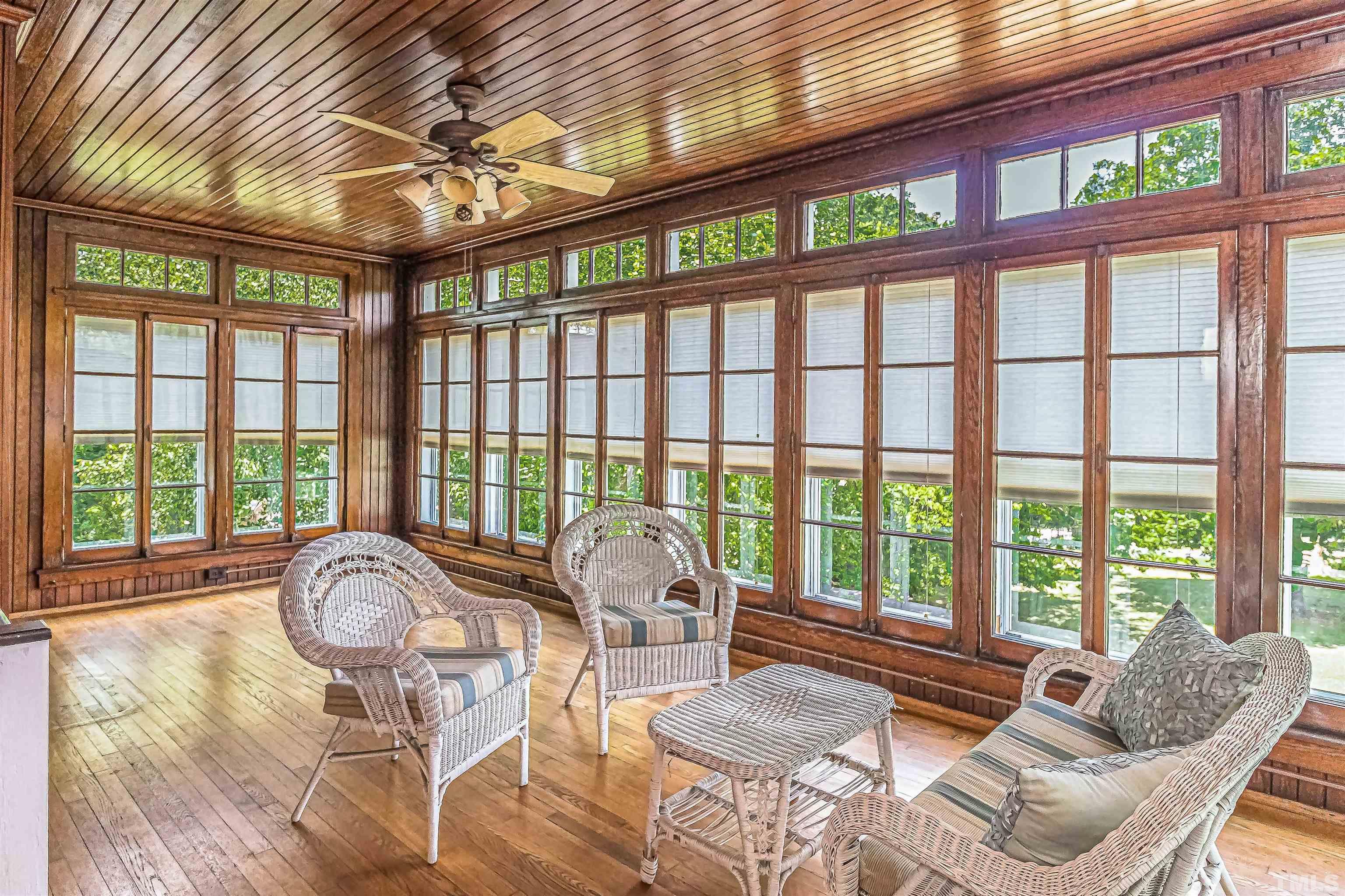 111 South George Street Goldsboro, NC 27530 - Photo 3 of 51 a living room filled with furniture and a large window