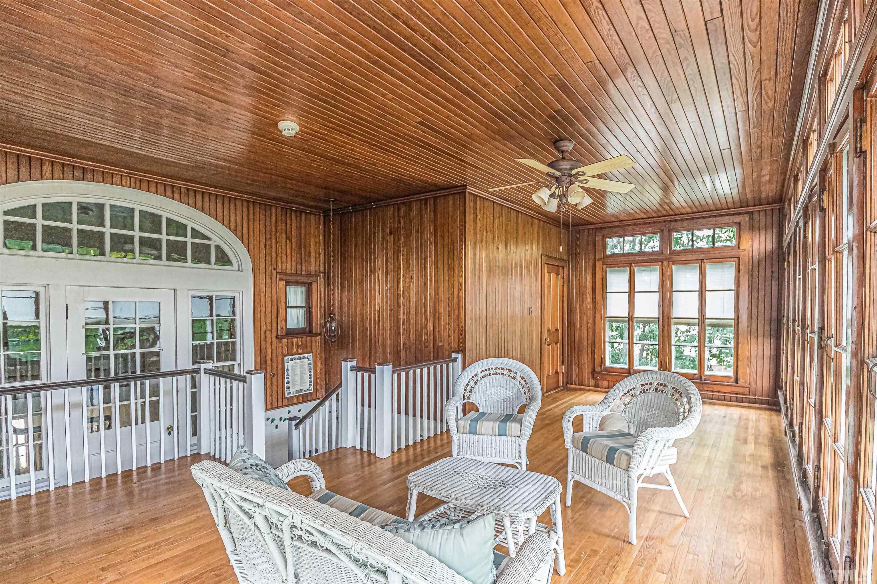 111 South George Street Goldsboro, NC 27530 - Photo 5 of 51 a view of a dining room with furniture wooden floor and chandelier