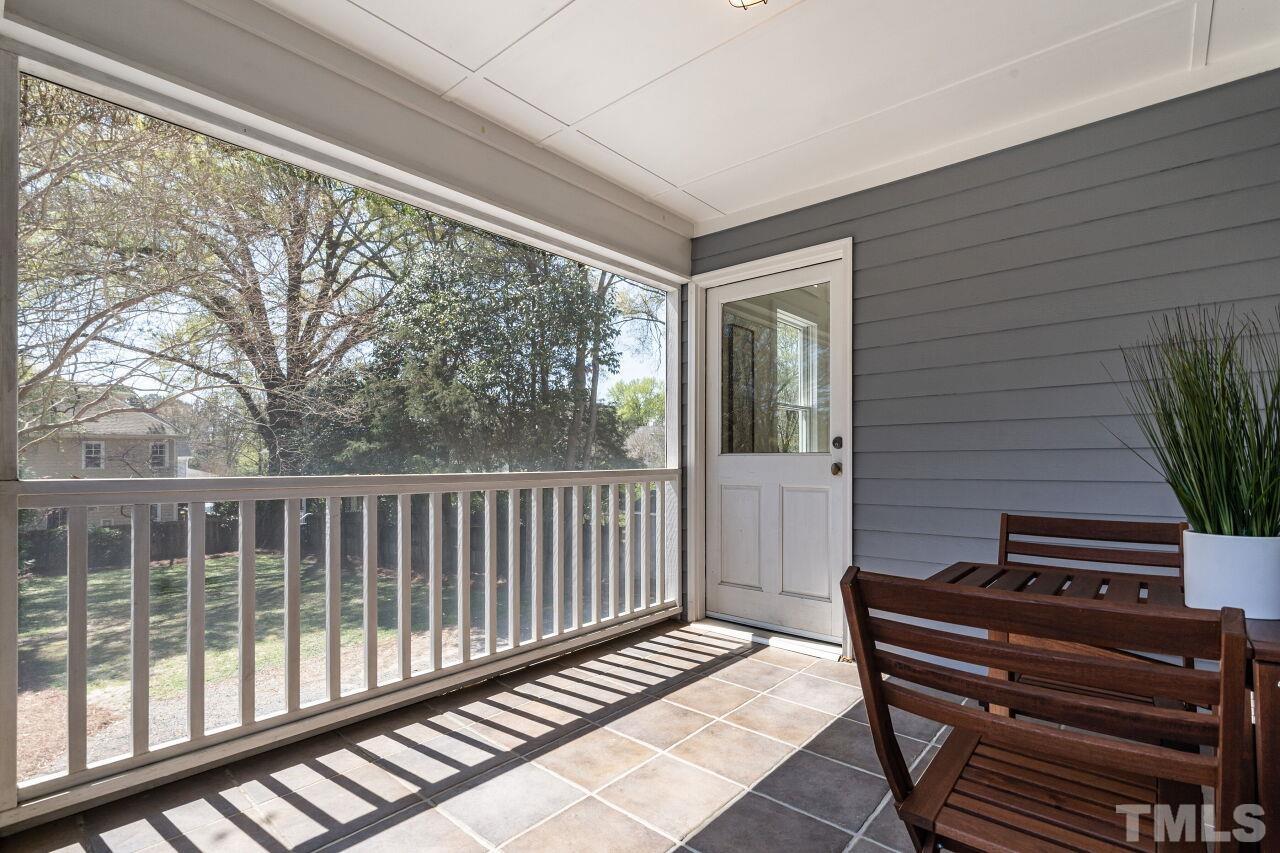 118 East Whitaker Mill Road Raleigh, NC 27608 - Photo 19 of 21 a view of a two chairs in the balcony