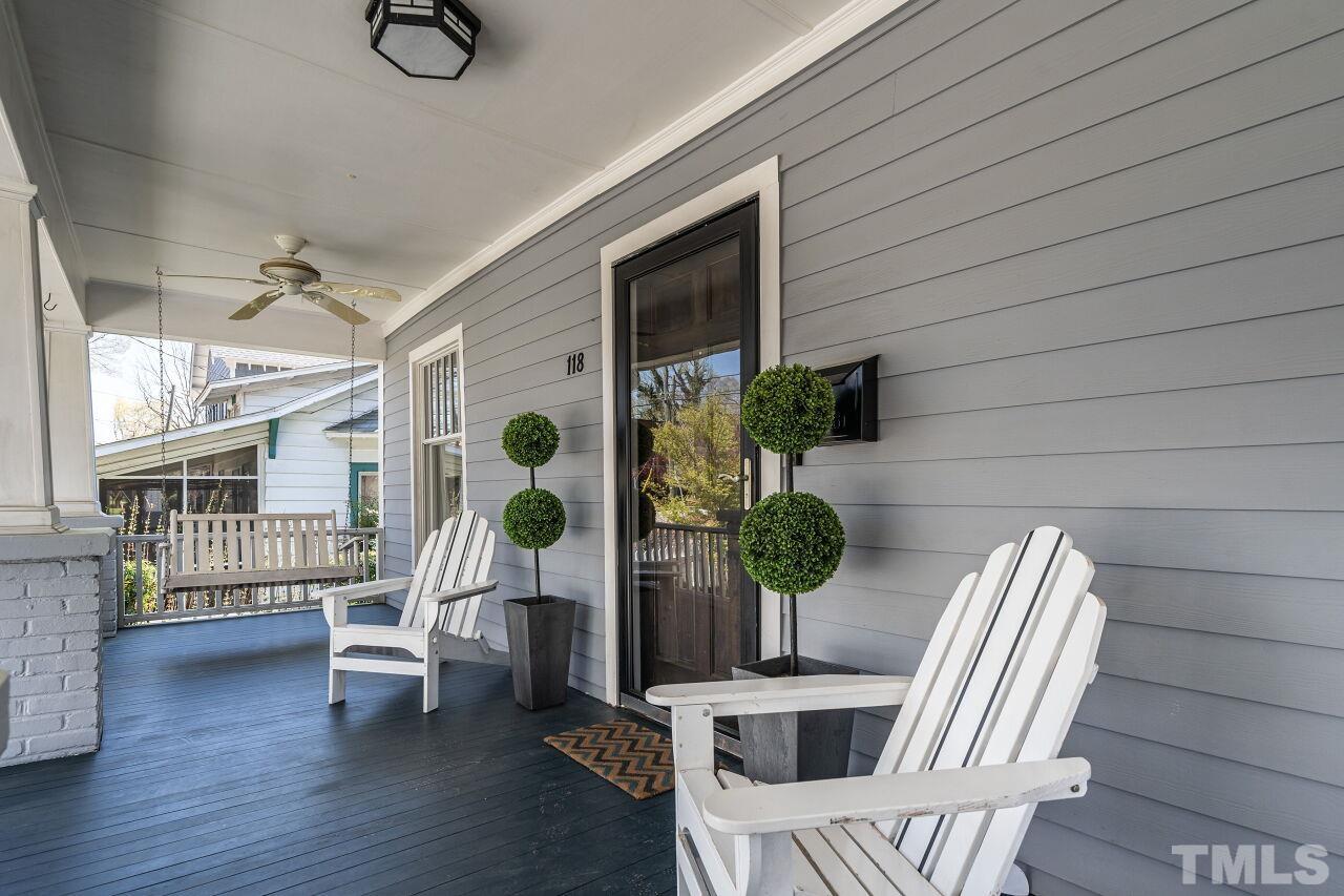 118 East Whitaker Mill Road Raleigh, NC 27608 - Photo 2 of 21 a view of backyard with a patio and furniture