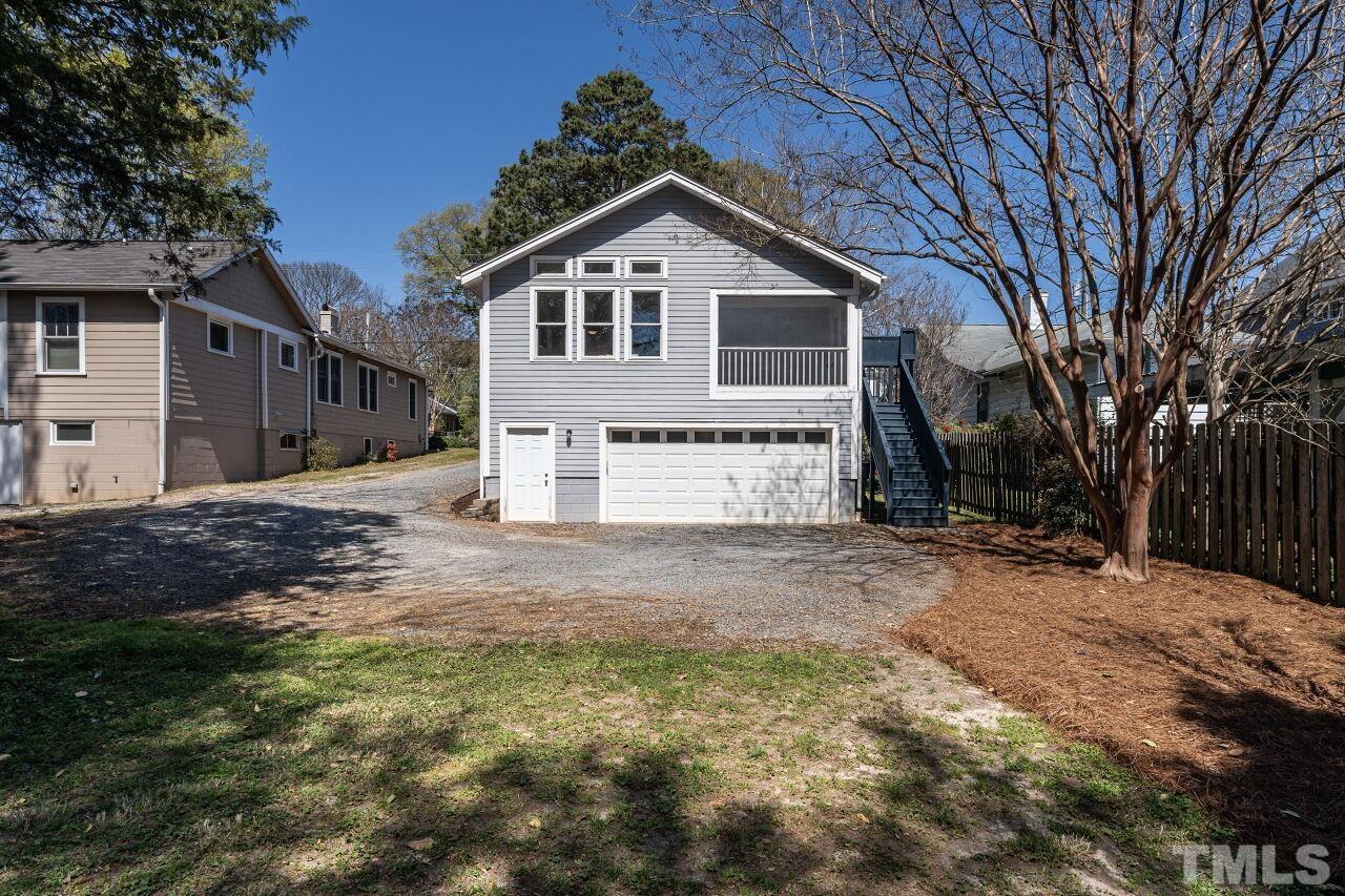 118 East Whitaker Mill Road Raleigh, NC 27608 - Photo 21 of 21 a view of a house with a yard