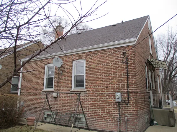 a brick building with a window