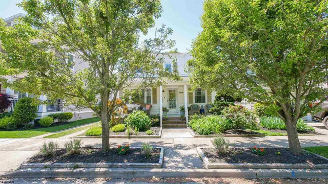 a view of a building with a tree