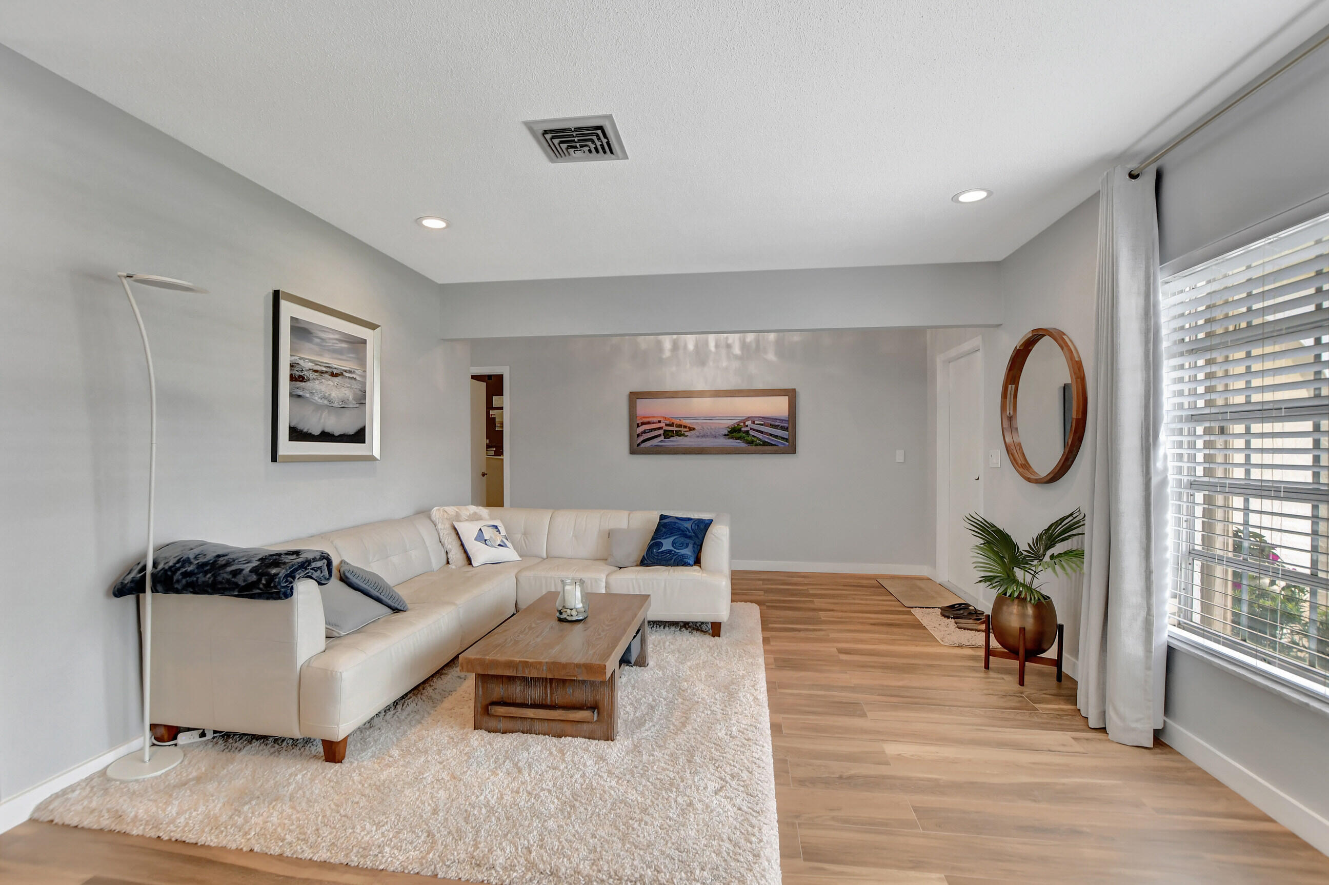 510 Silver Lane Boca Raton, FL 33432 - Photo 2 of 24 a living room with furniture and a large window