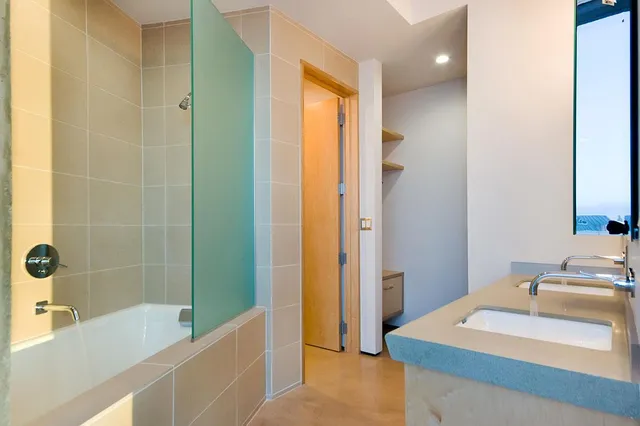 a view of a balcony with two chairs