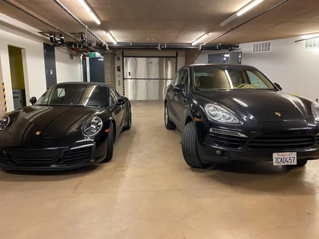 a view of a porch with a floor to ceiling window and a yard