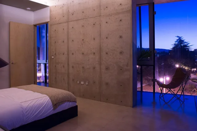 a view of a brick building next to a street