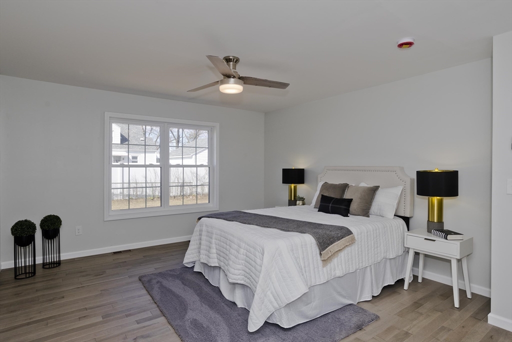 72 Lancaster Street Springfield, MA 01118 - Photo 14 of 35 a bedroom with a bed and a window