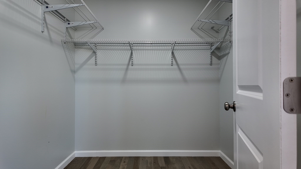 72 Lancaster Street Springfield, MA 01118 - Photo 16 of 35 a view of a room with racks on the wall