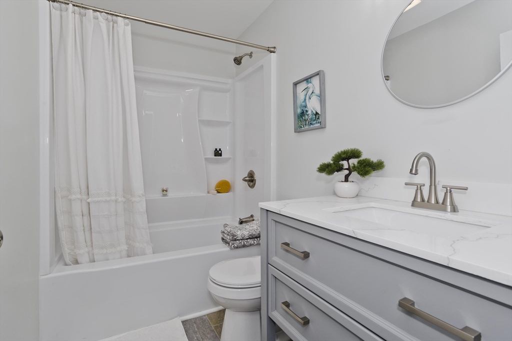 72 Lancaster Street Springfield, MA 01118 - Photo 19 of 35 a bathroom with a sink toilet and shower