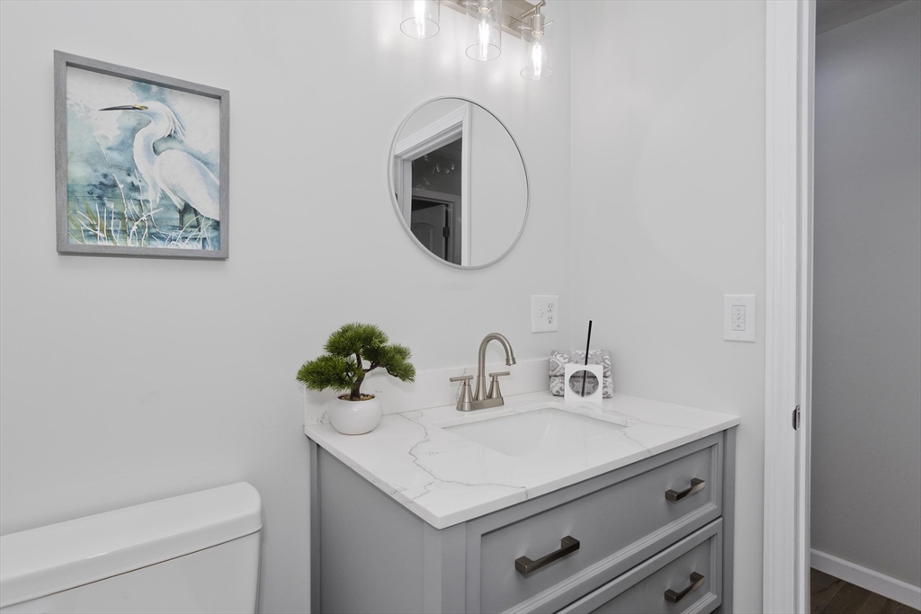 72 Lancaster Street Springfield, MA 01118 - Photo 20 of 35 a bathroom with a sink and a mirror