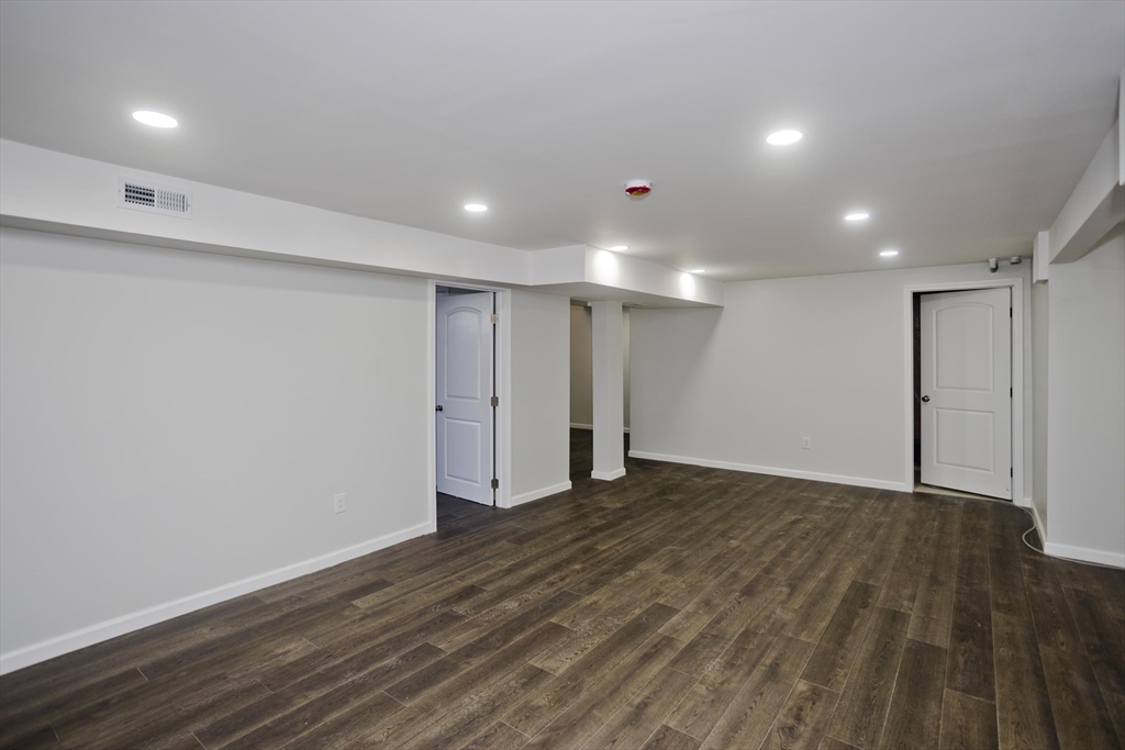72 Lancaster Street Springfield, MA 01118 - Photo 24 of 35 a view of an empty room with wooden floor