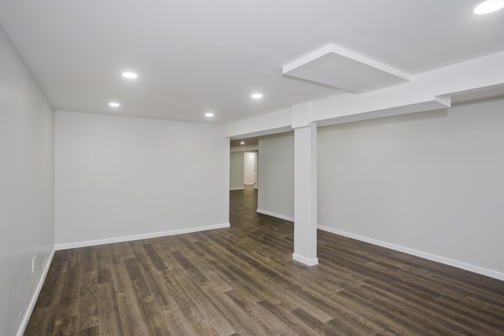 72 Lancaster Street Springfield, MA 01118 - Photo 25 of 35 a view of an empty room with wooden floor