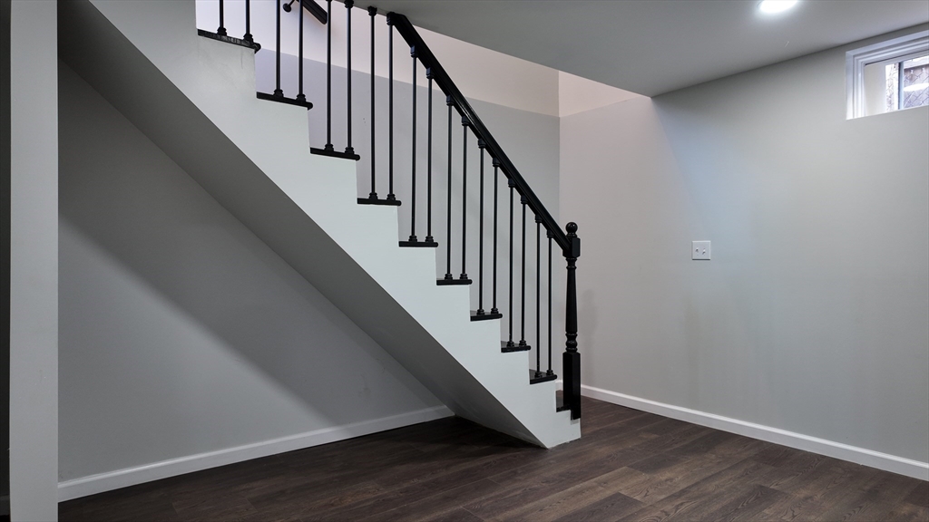 72 Lancaster Street Springfield, MA 01118 - Photo 26 of 35 a view of staircase with wooden floor and white walls