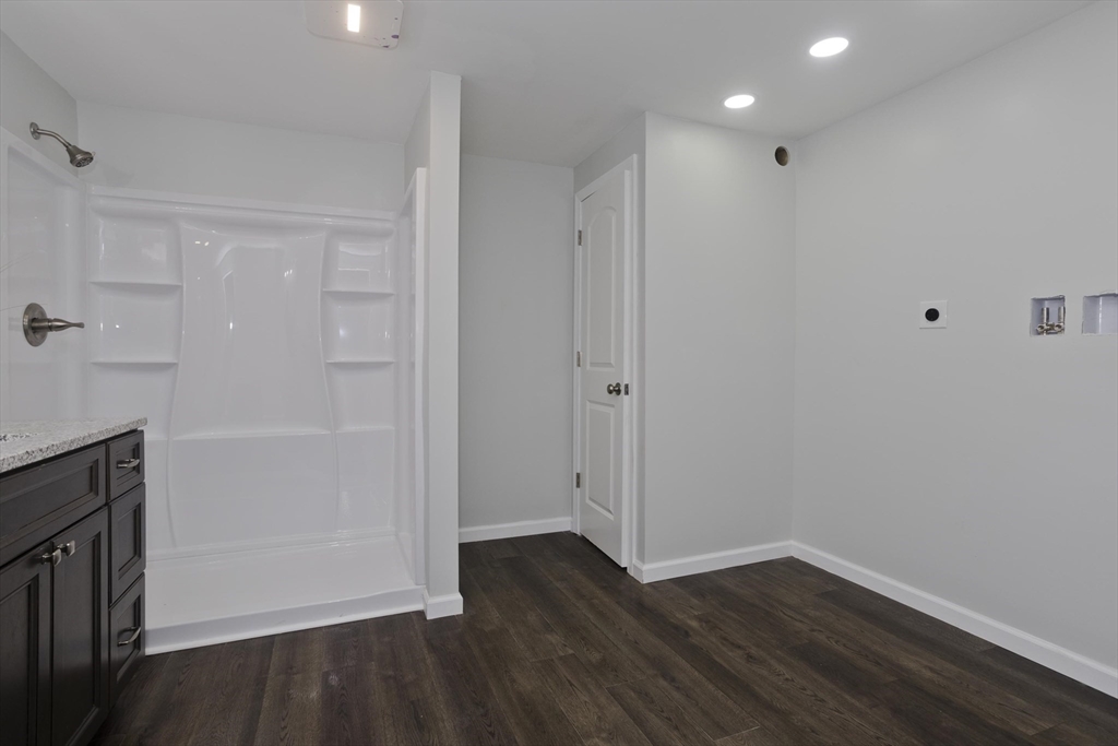 72 Lancaster Street Springfield, MA 01118 - Photo 31 of 35 a view of an empty room with wooden floor