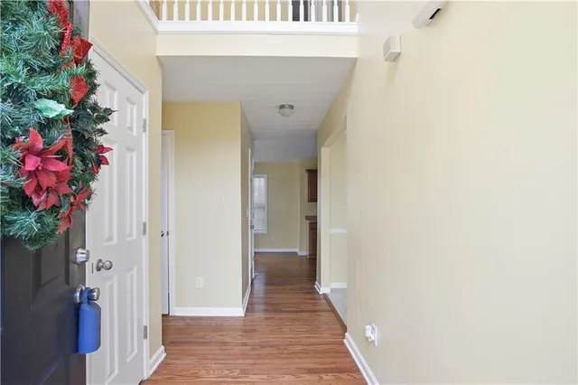a view of a hallway with flowers