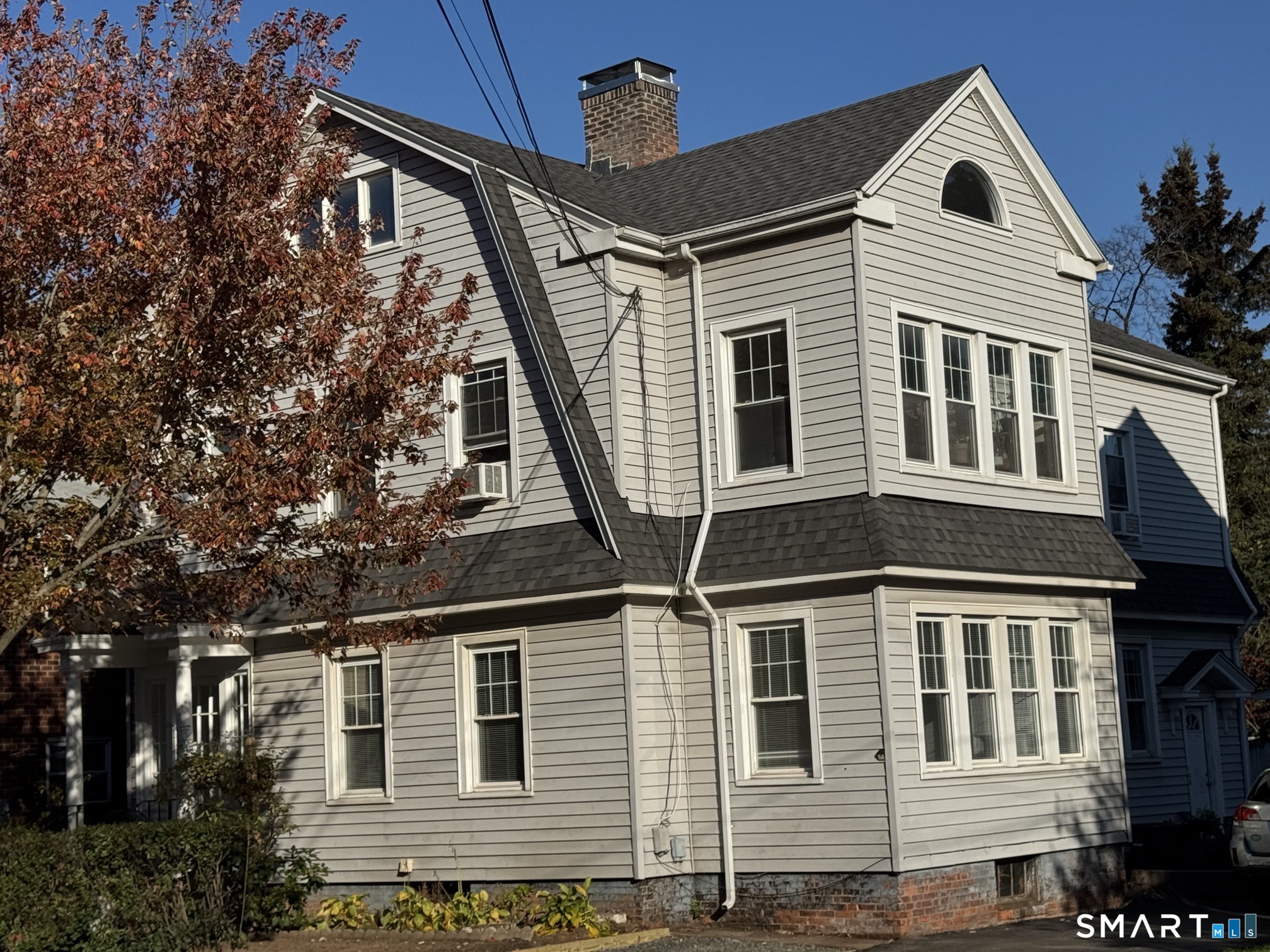 1253 Forest Road, Unit 2 New Haven, CT 06515 - Photo 4 of 30 a view of outdoor space and front view of a house