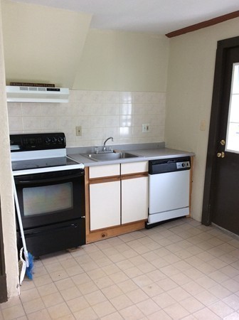 592 Trapelo Road Belmont, MA 02478 - Photo 12 of 23 a kitchen with a stove and a sink