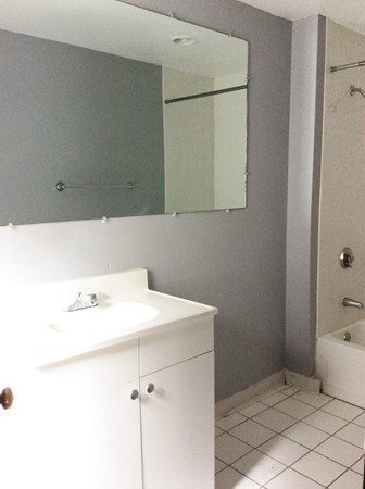 592 Trapelo Road Belmont, MA 02478 - Photo 13 of 23 a bathroom with a sink and a vanity