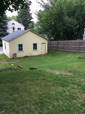 592 Trapelo Road Belmont, MA 02478 - Photo 18 of 23 a view of a backyard with plants and large trees