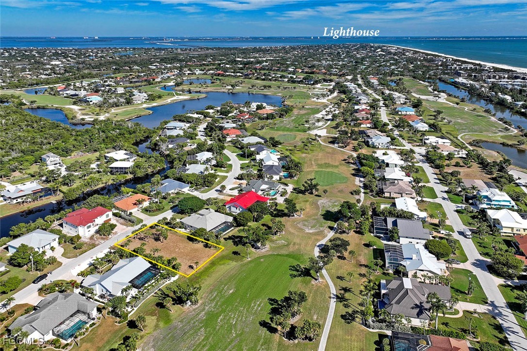 1292 Par View Drive Sanibel, FL 33957 - Photo 15 of 18 an aerial view of a city and mountain