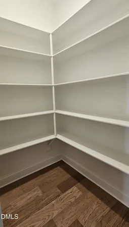 a view of an empty room with empty racks