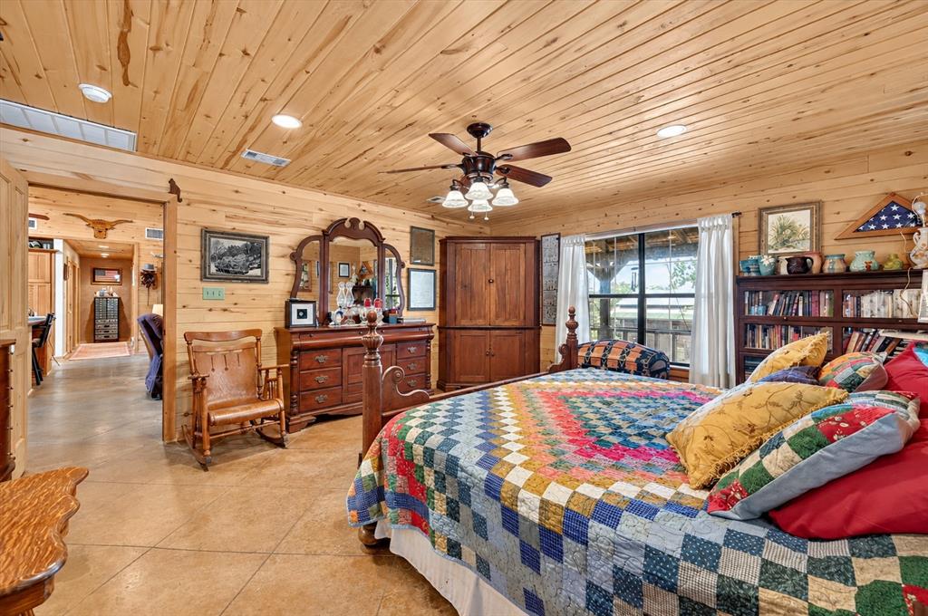 1623 3 Skillet Road Springtown, TX 76082 - Photo 11 of 40 Wood-paneled walls and ceiling with recessed lighting