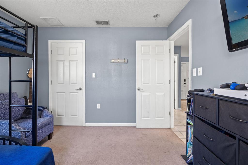 8025 Durham Drive Port Richey, FL 34668 - Photo 13 of 30 a view of a hallway with workspace
