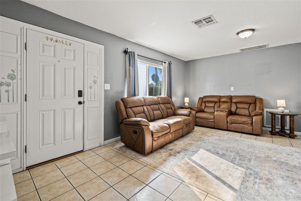 8025 Durham Drive Port Richey, FL 34668 - Photo 19 of 30 a living room with furniture